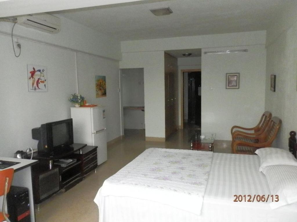 Xingfu Hotel Nanning Habitación foto