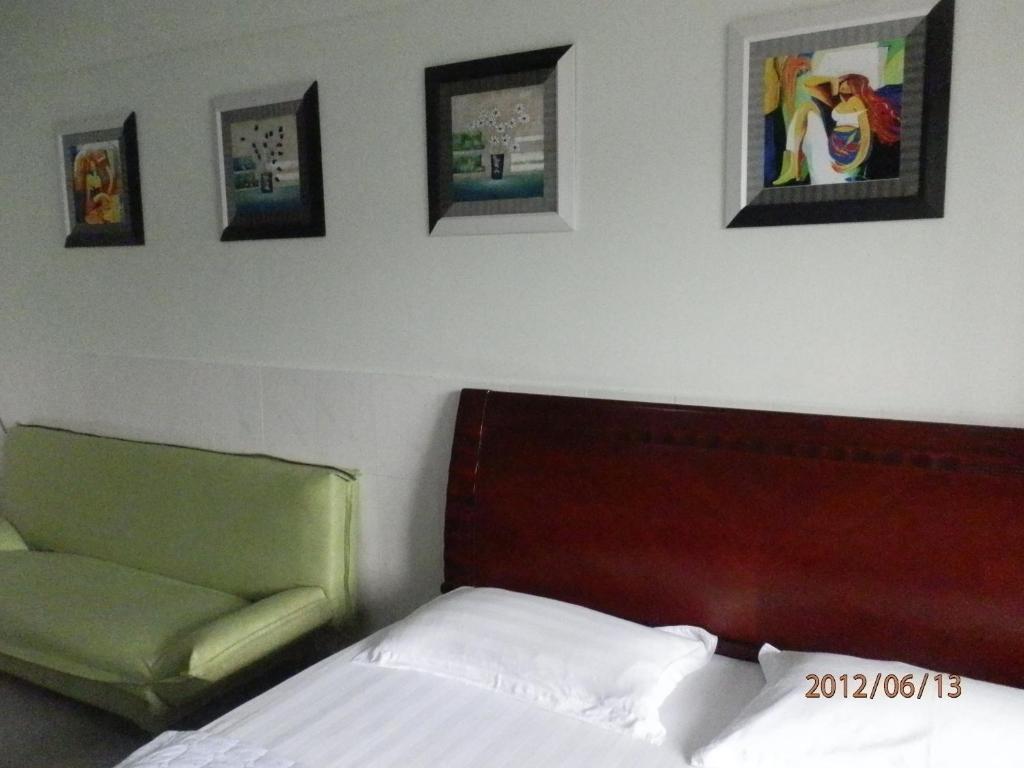 Xingfu Hotel Nanning Habitación foto